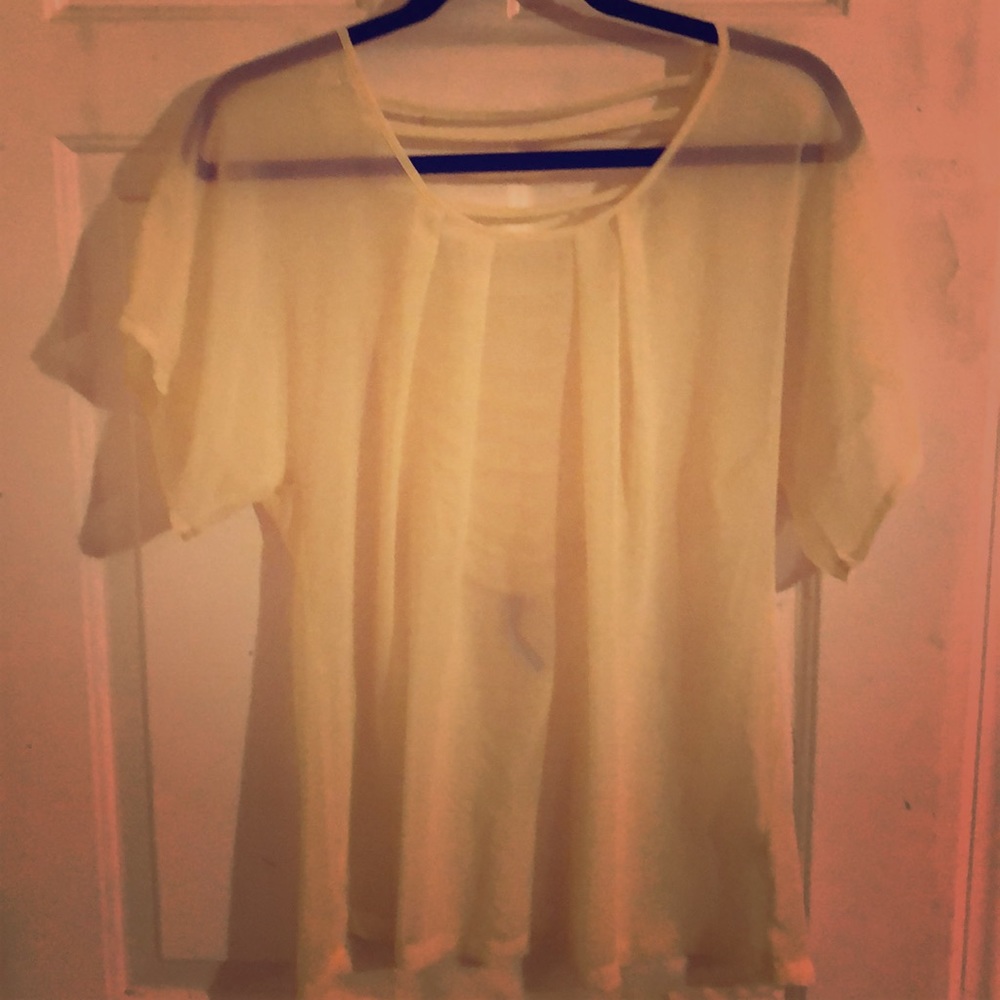 Sheer tank with back cutout's